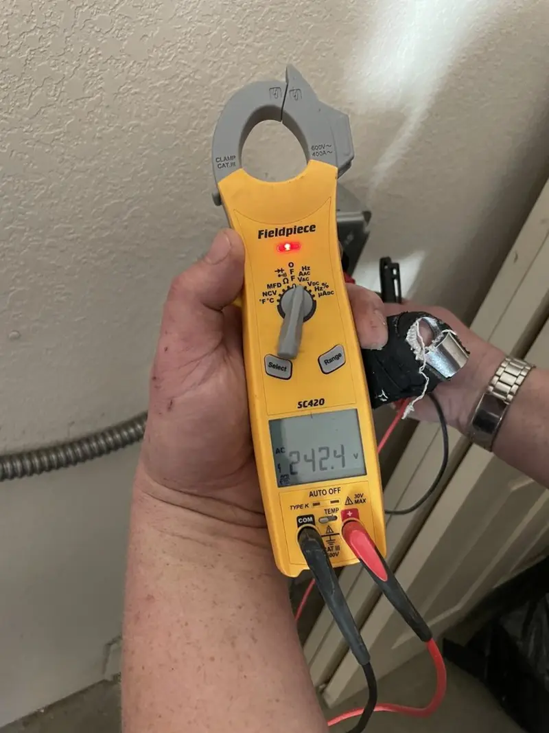 Voltage testing with clamp meter during Generator Installation in Fordyce